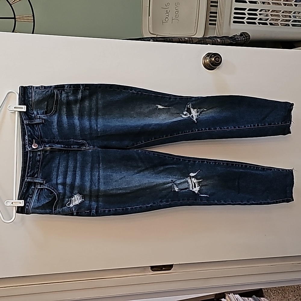 Maurices Mid Rise Blue Denim Jeans. Size Large Short. Tattered hip and knees.